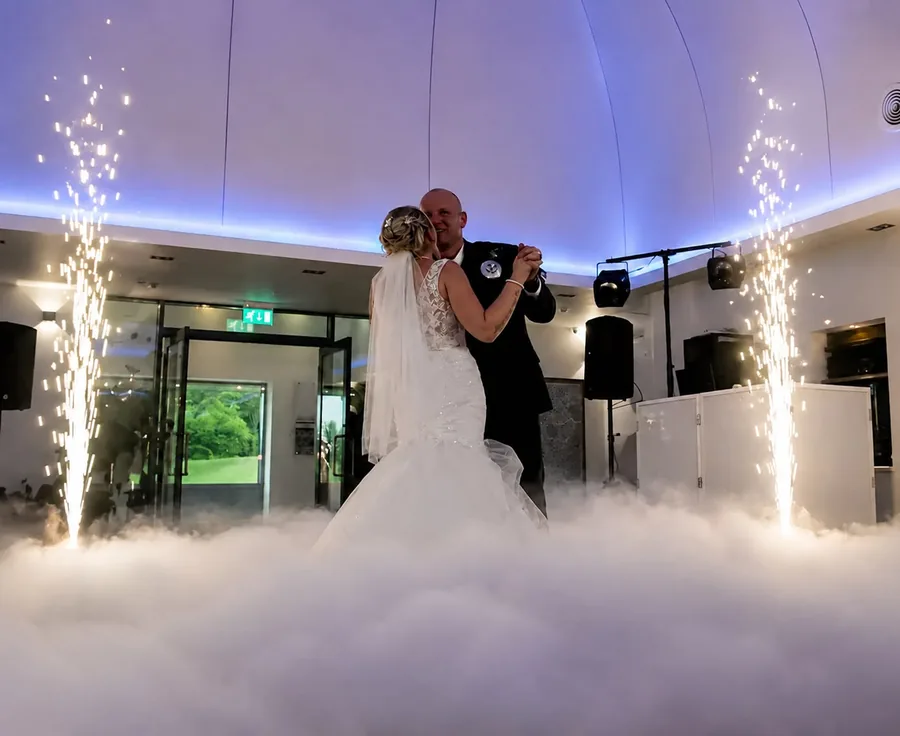 First dance on dry ice clouds with cold spark fountains